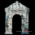 arched antique stone door surround with lady carving